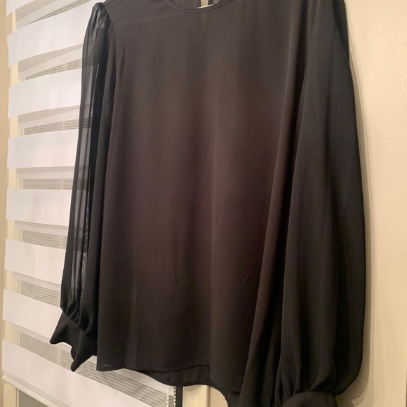 Calvin Klein - Picture 6 of 7